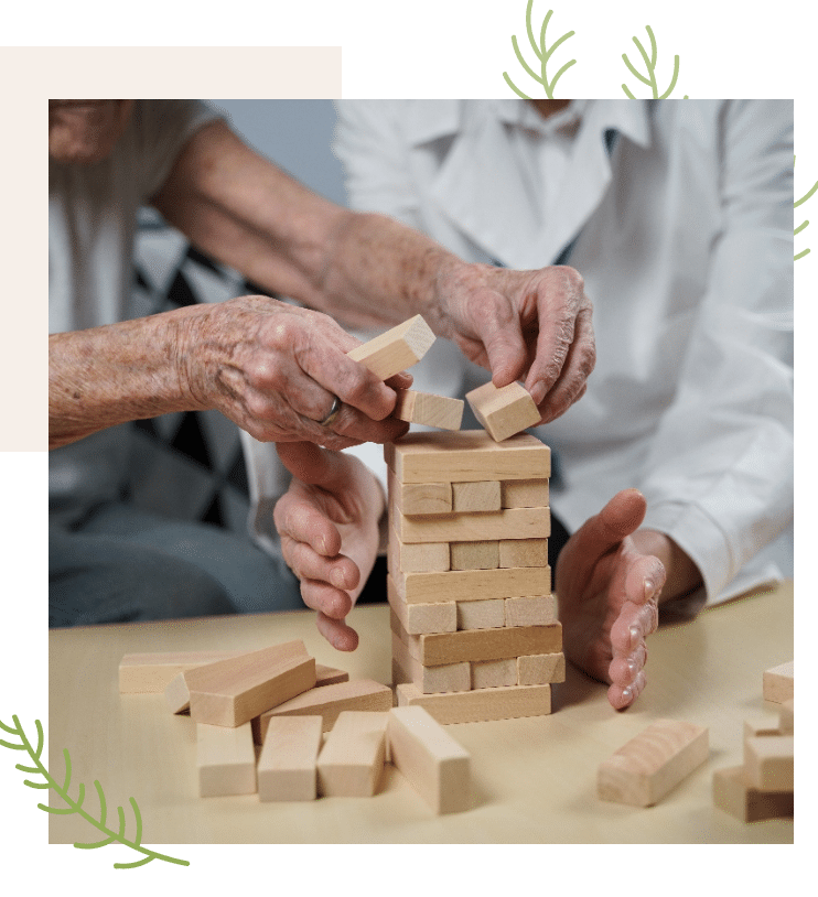 Seniors Playing a game of Jenga